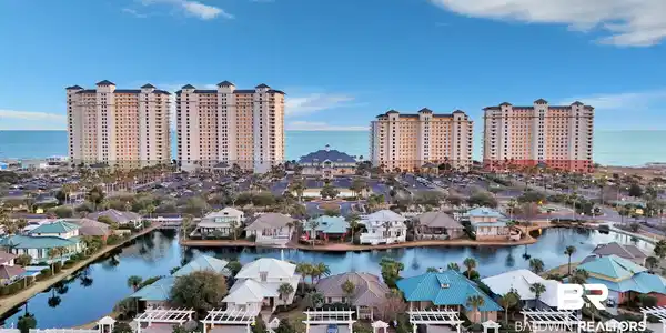 Image 3: View of urban area with a large body of water