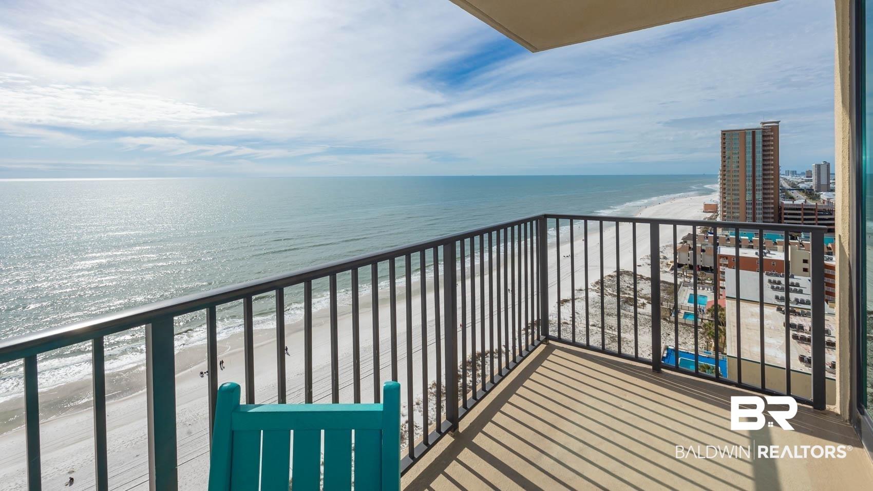 Image 4: Balcony with view of water and beach