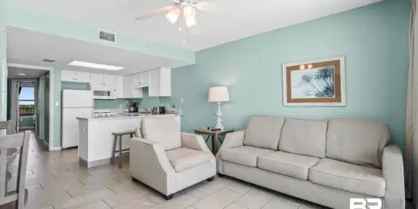 Image 4: Living area featuring a ceiling fan and a textured ceiling