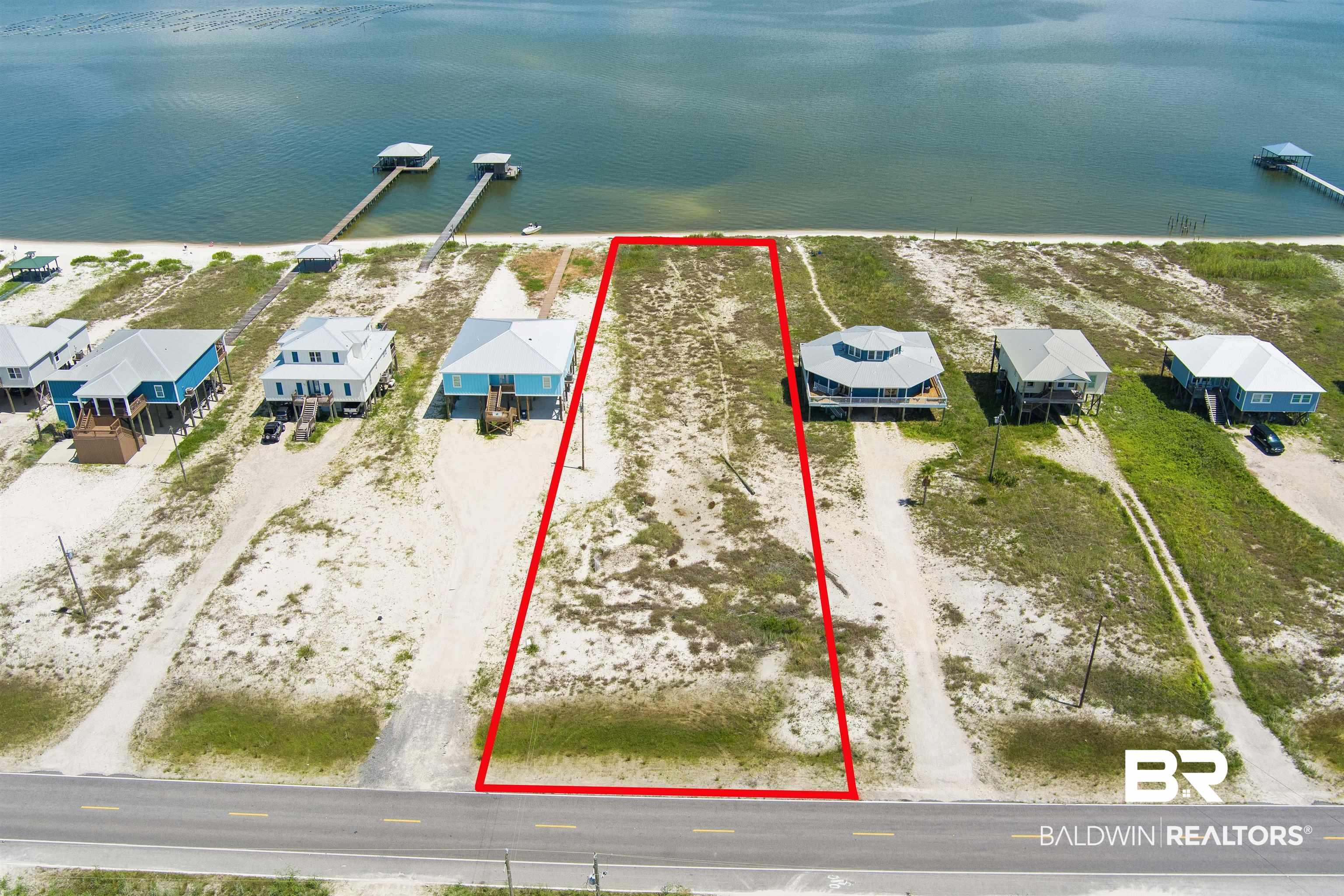 Image 1: Birds eye view of property with a water view