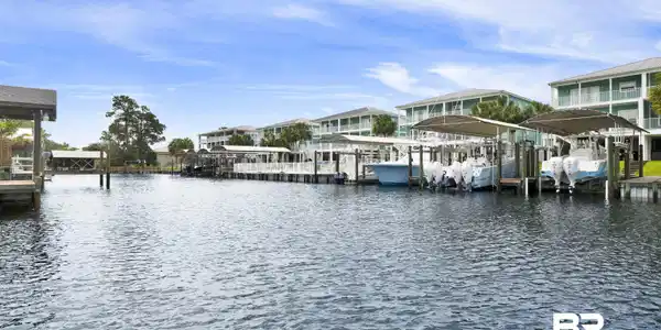 Image 4: Waterfront properties with private boat slips featuring covered boat lifts
