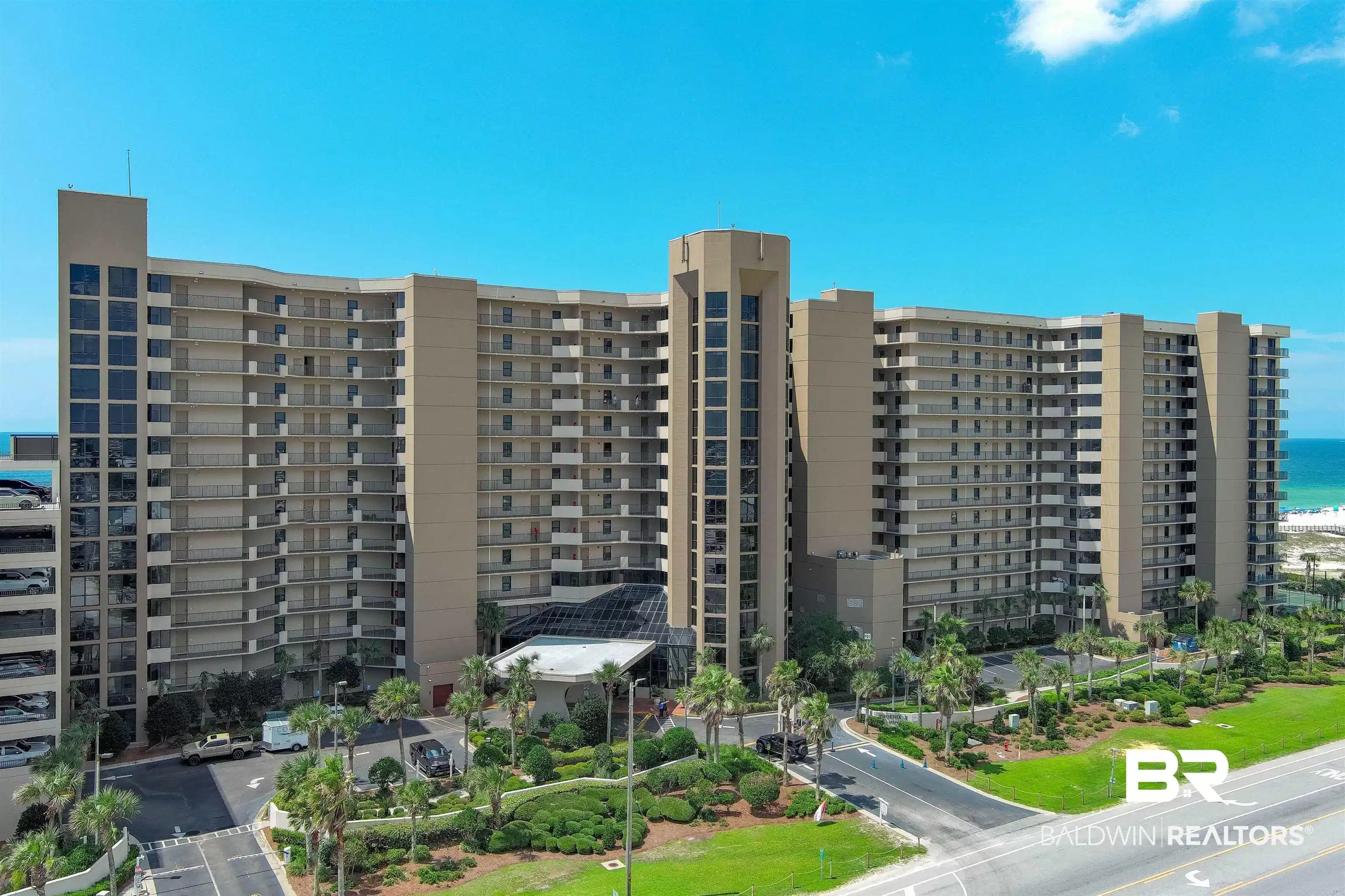 Image 1: View of apartment building / complex featuring a water view