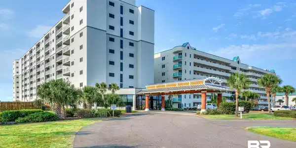 Image 3: Expansive residential building featuring multiple private balconies