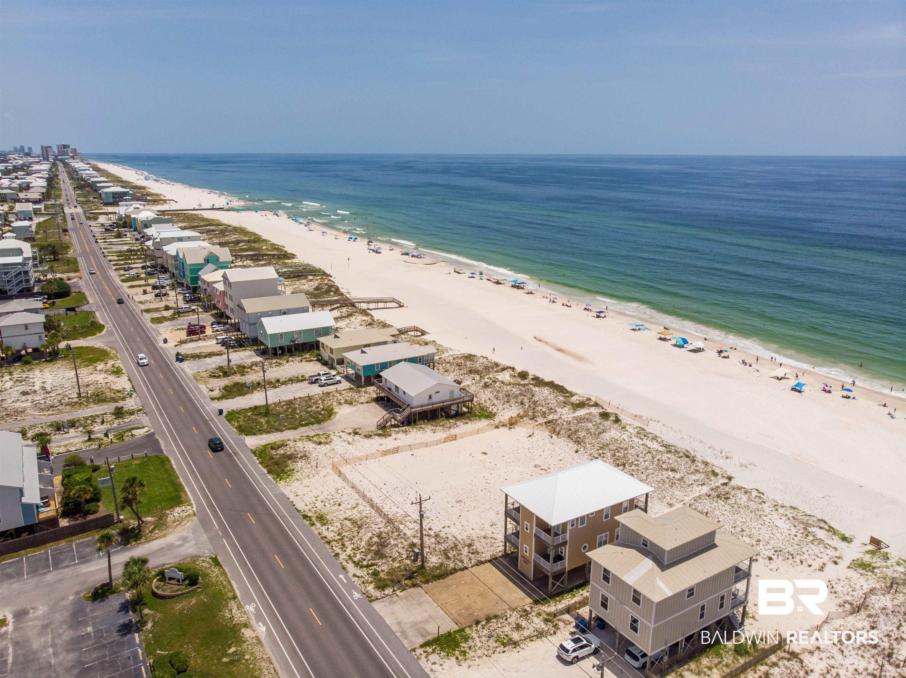 Image 3: Bird's eye view featuring a water view and a beach view