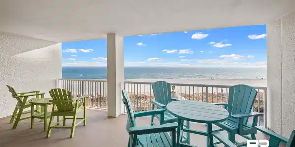 Image 3: Balcony with view of water and beach
