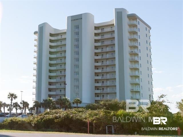 Image 1: View of apartment building / complex