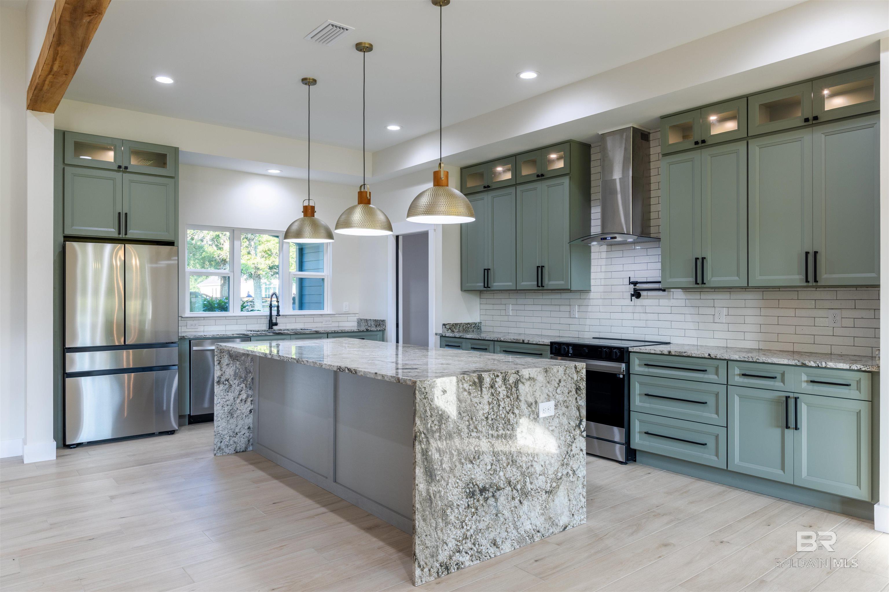 Image 4: Custom Kitchen with Stainless Appliances