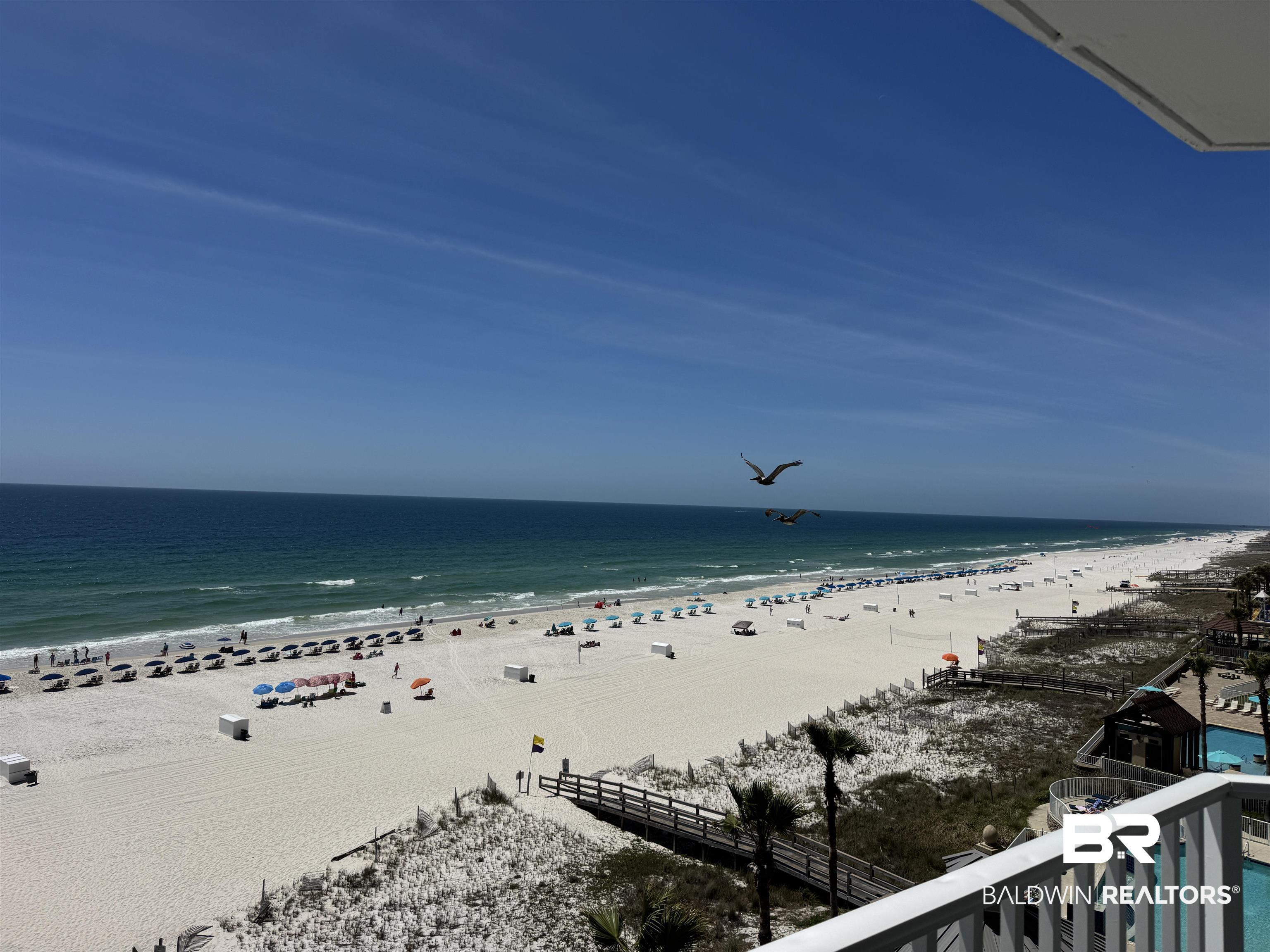 Image 1: Water view with local beach
