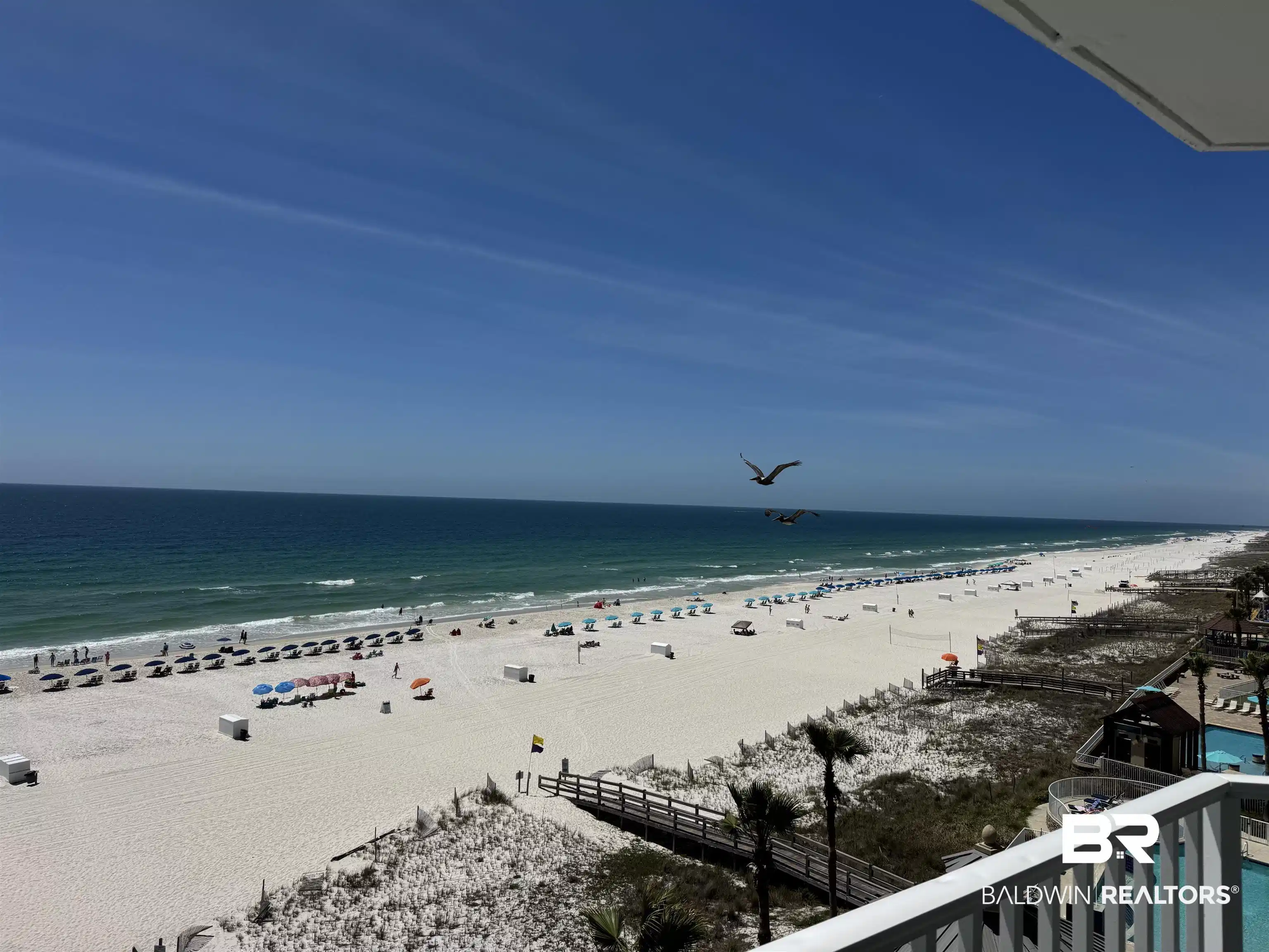 Image 1: Water view with local beach