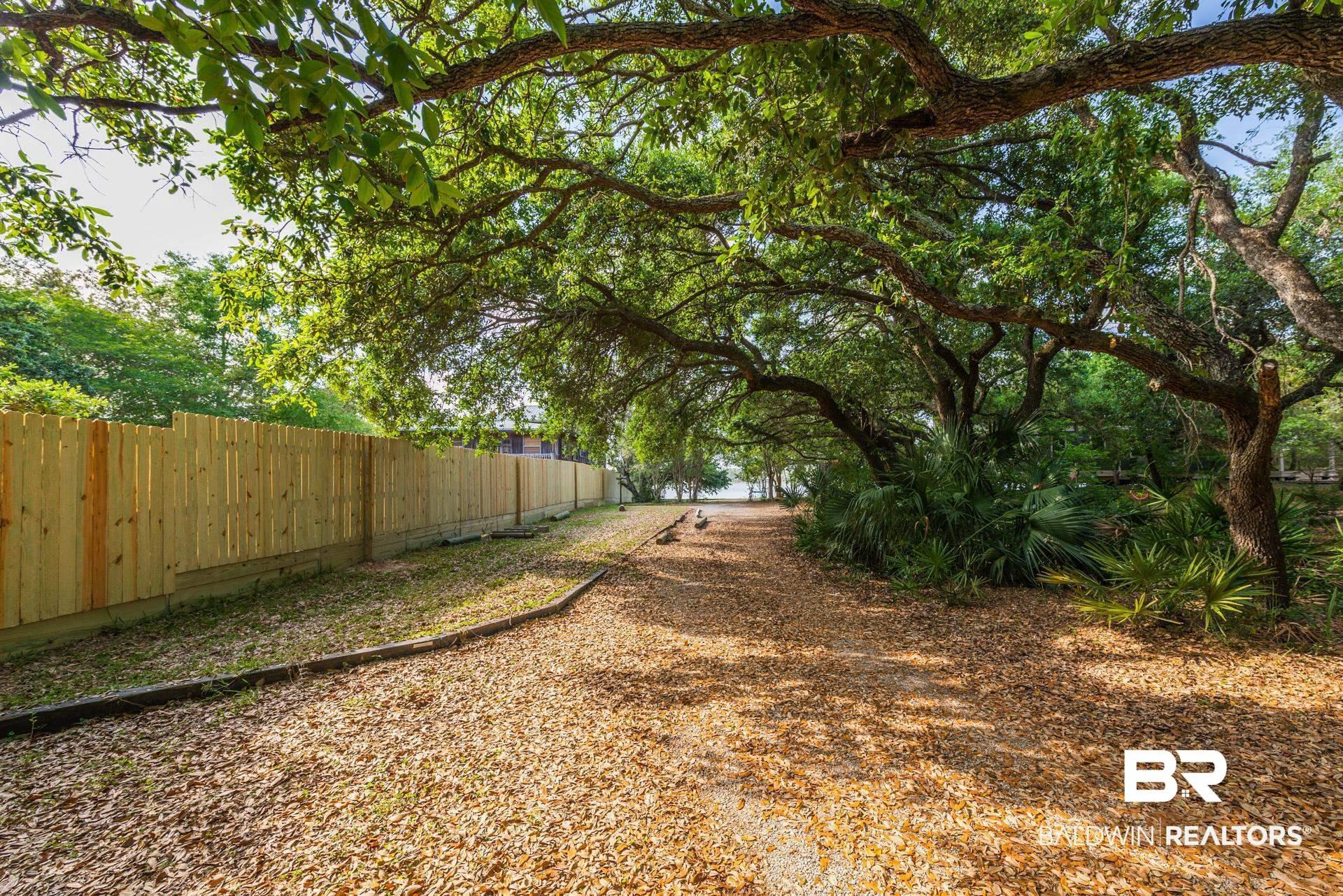 Image 2: View of yard with fence