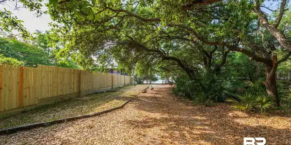 Image 2: View of yard with fence