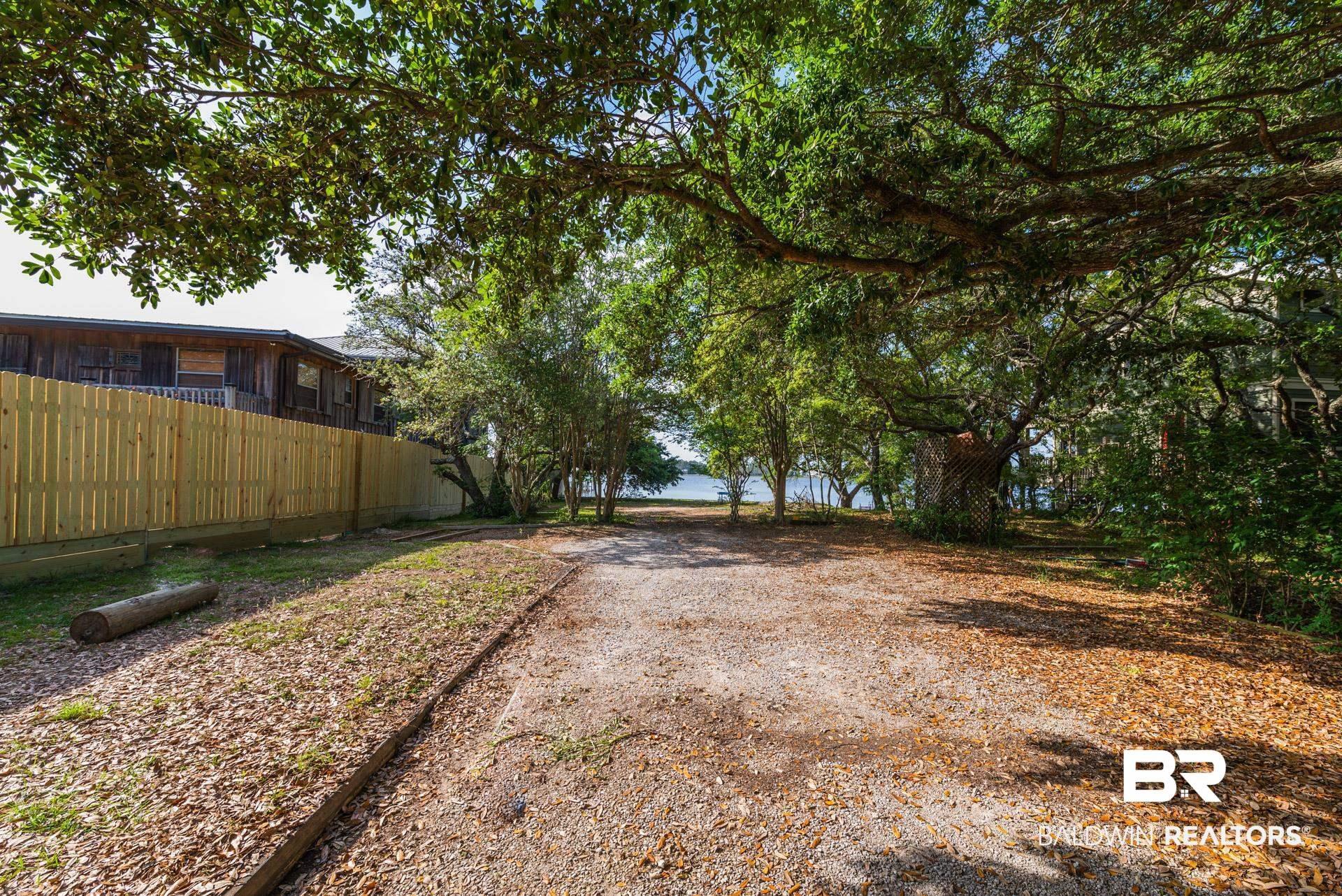 Image 3: View of yard with fence