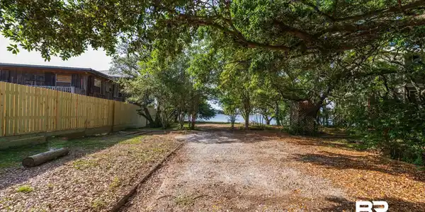 Image 3: View of yard with fence