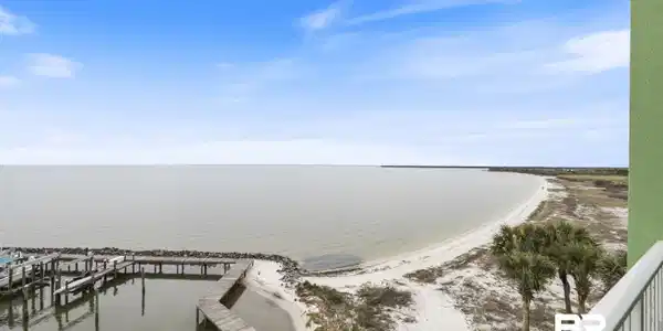 Image 4: Water view with a boat dock