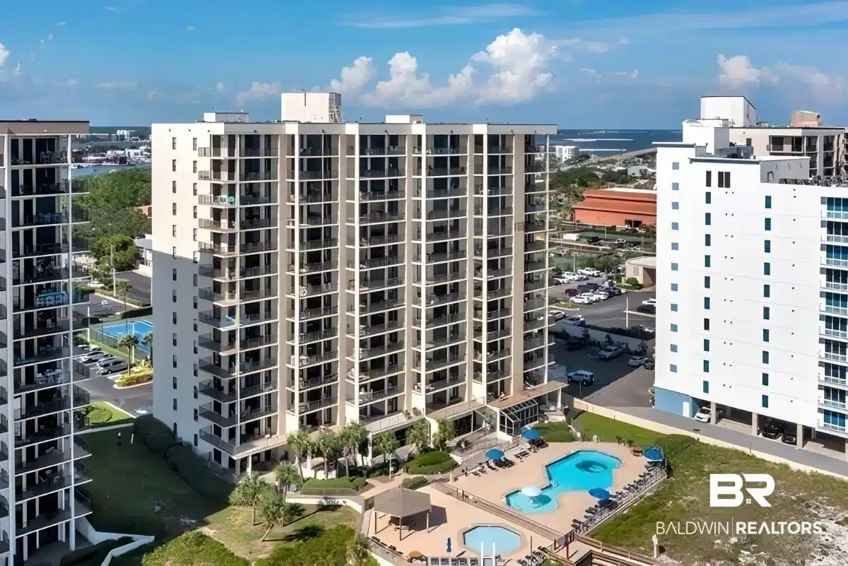Image 1: View of apartment building / complex featuring a water view