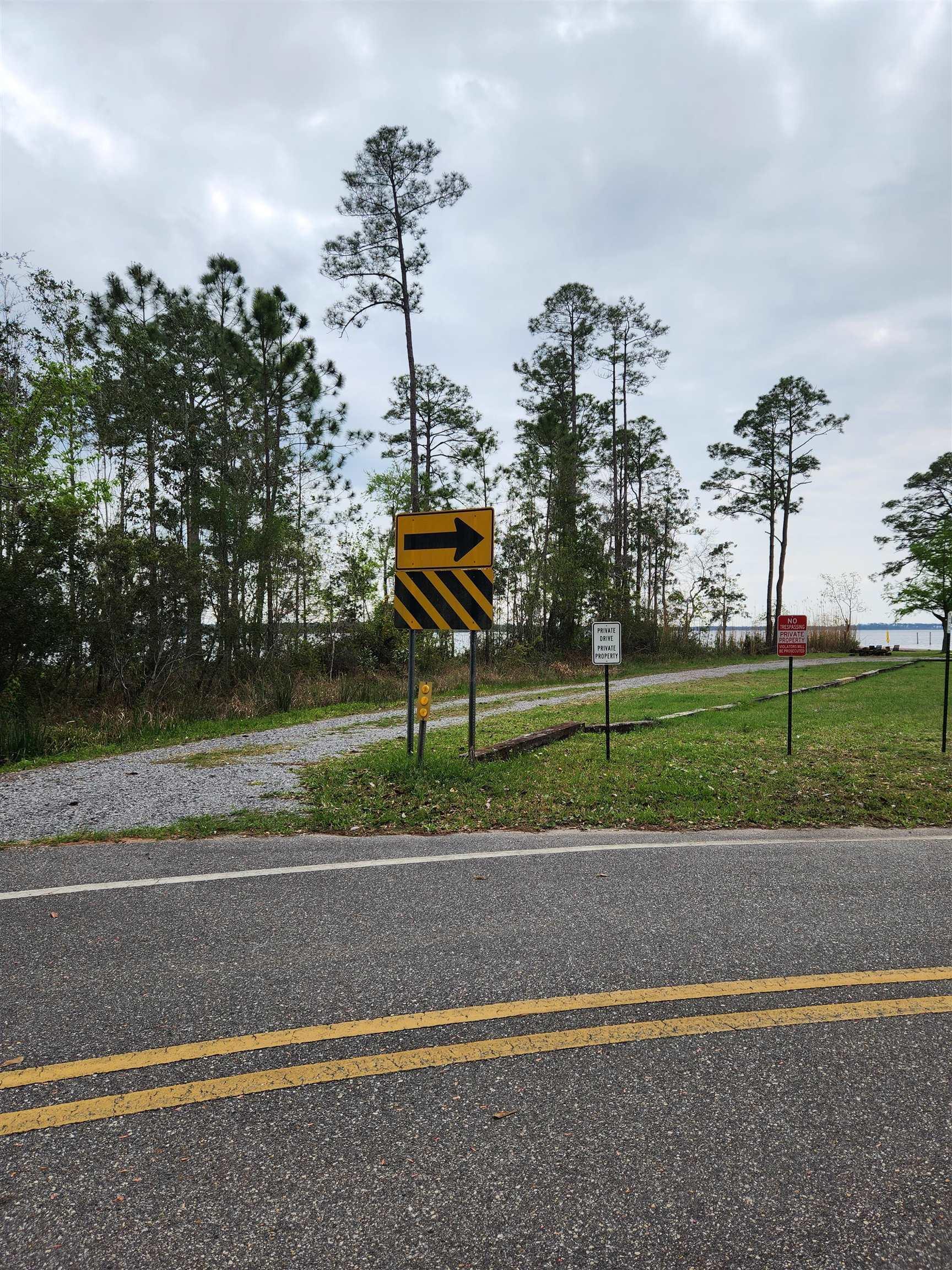 Image 4: View of road featuring traffic signs