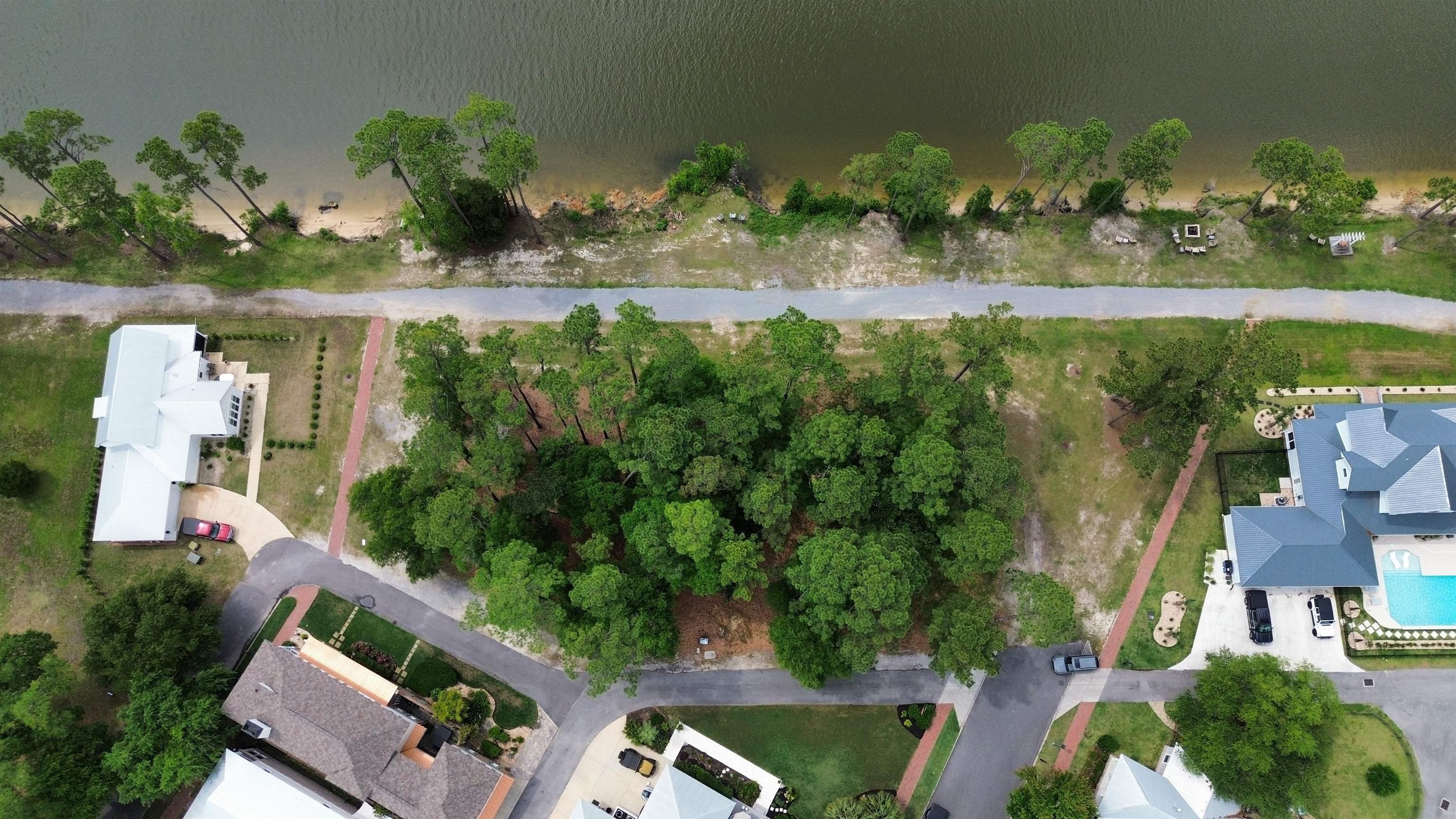 Image 2: Aerial view of property's location featuring a pool area