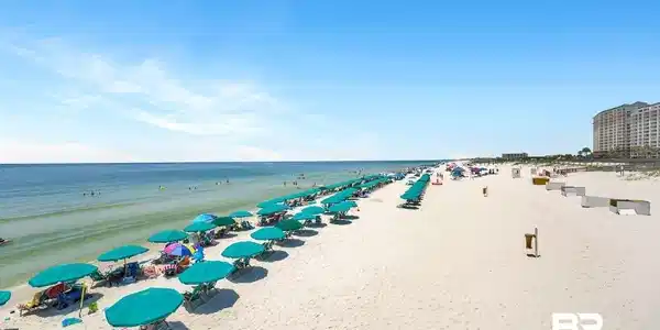 Image 2: Expansive white sand beach with turquoise water
