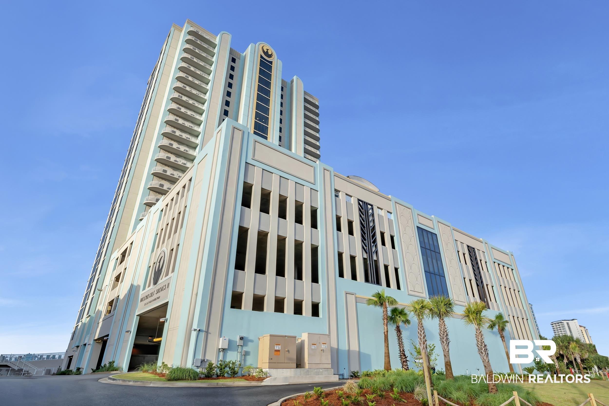 Image 1: Modern high-rise with multi-story parking structure, featuring light blue and beige exterior paneling