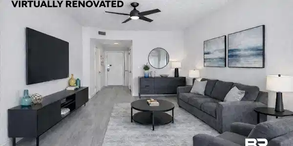 Image 4: Living area with a ceiling fan, wood finished floors, and a textured ceiling