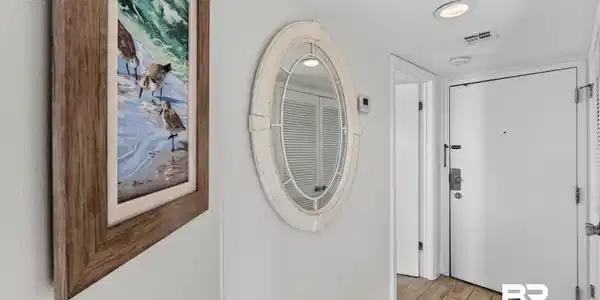 Image 2: Corridor with wood tiled floors