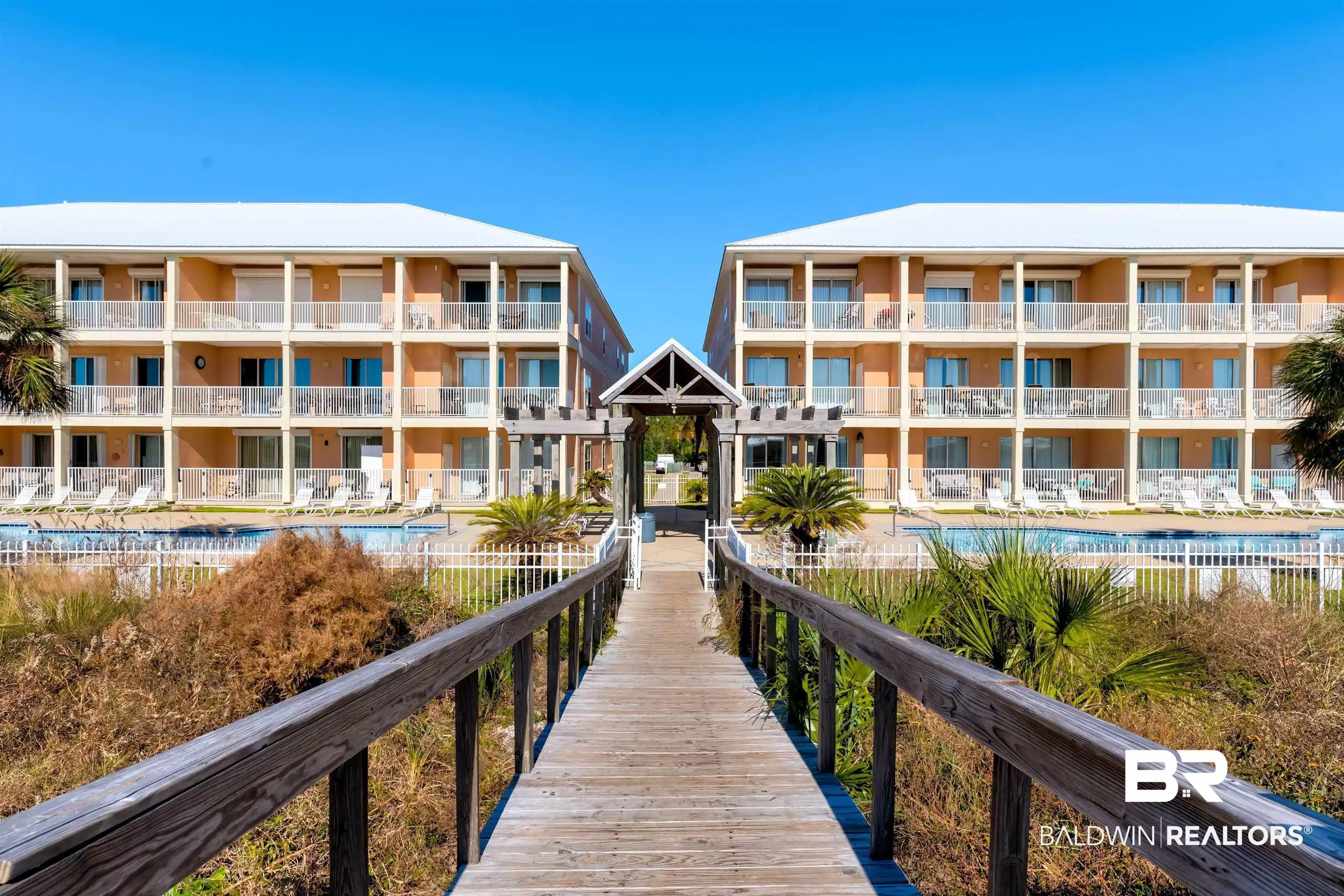 Image 1: View of apartment building / complex