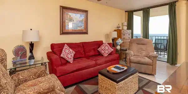 Image 3: Living area featuring light yellow walls and tile flooring
