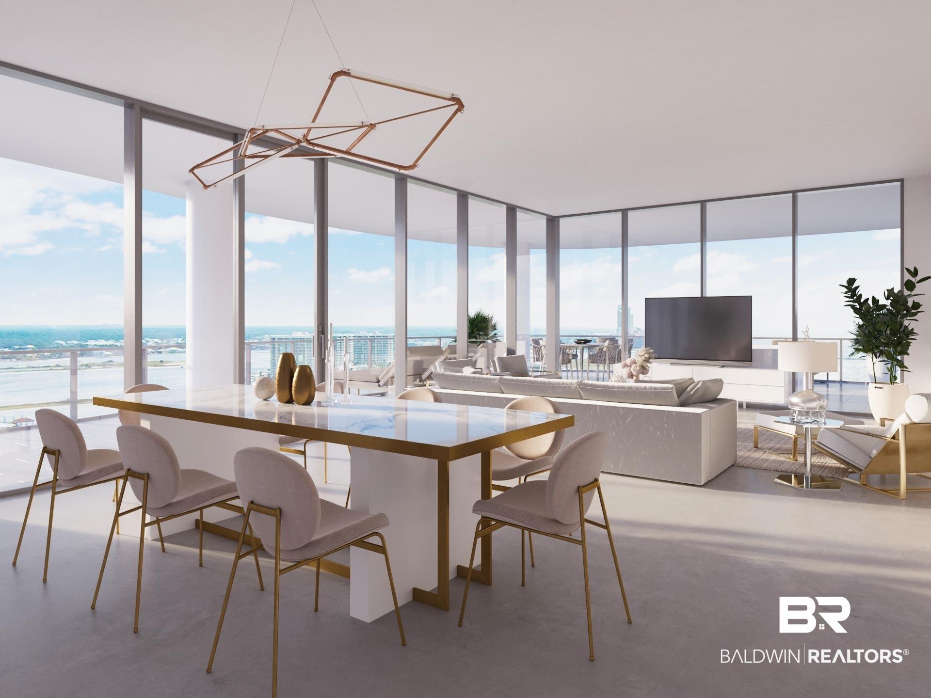 Image 4: Dining space featuring a water view and floor to ceiling windows