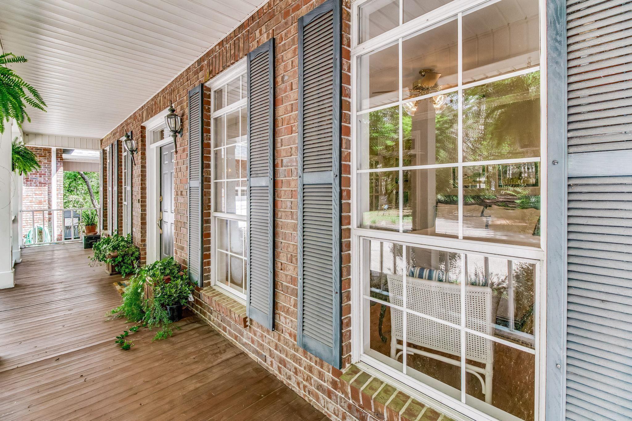 Image 3: Exterior space featuring covered porch