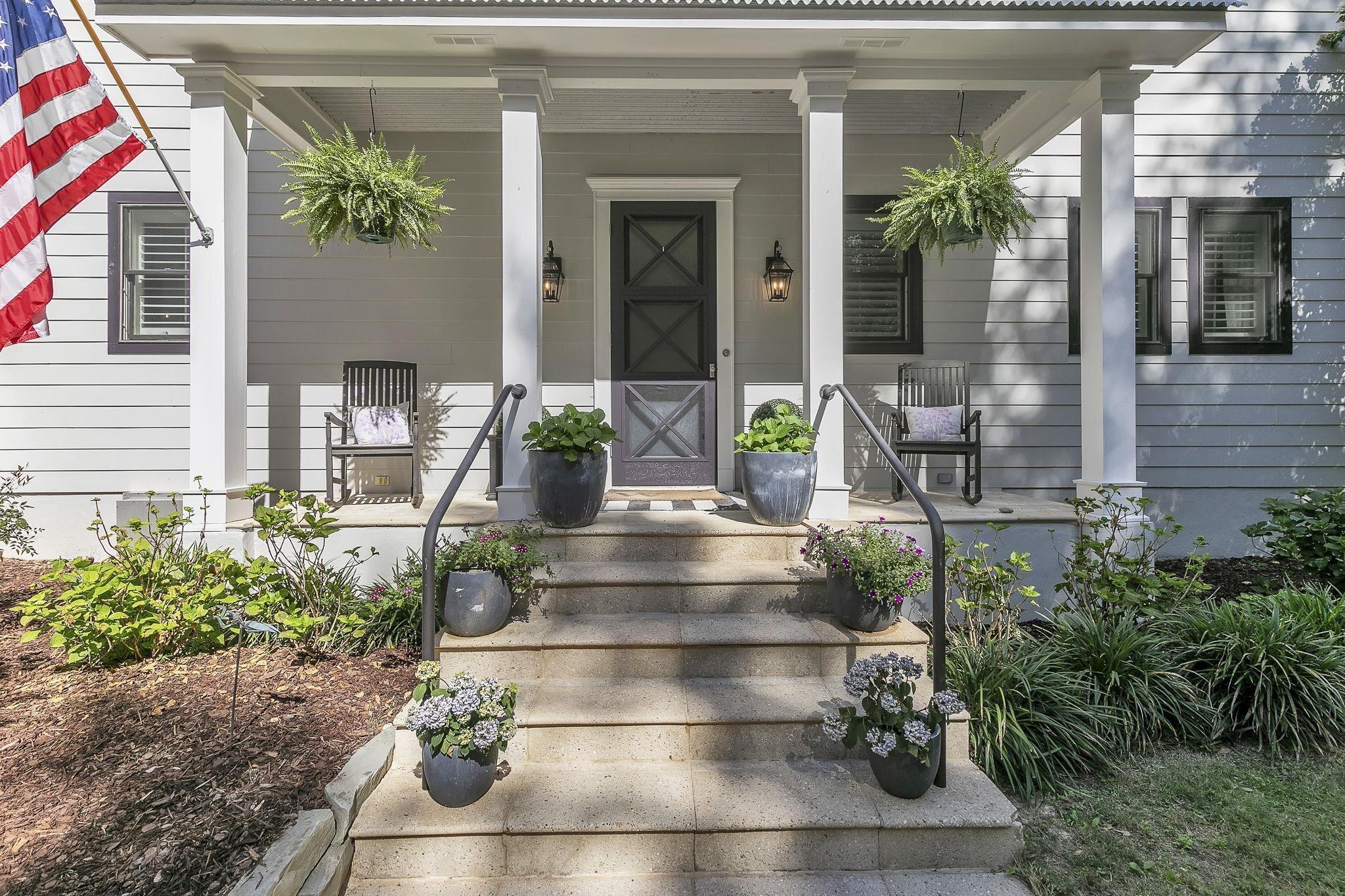 Image 2: Property entrance with a porch