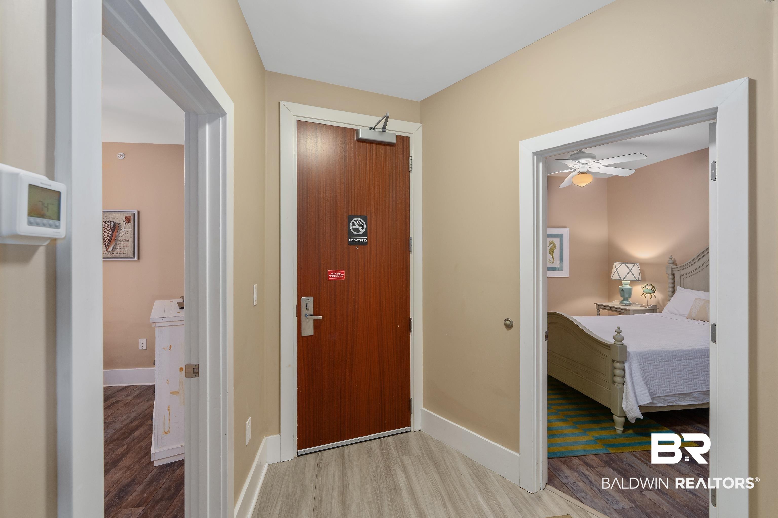 Image 2: Foyer featuring ceiling fan and hardwood / wood-style floors