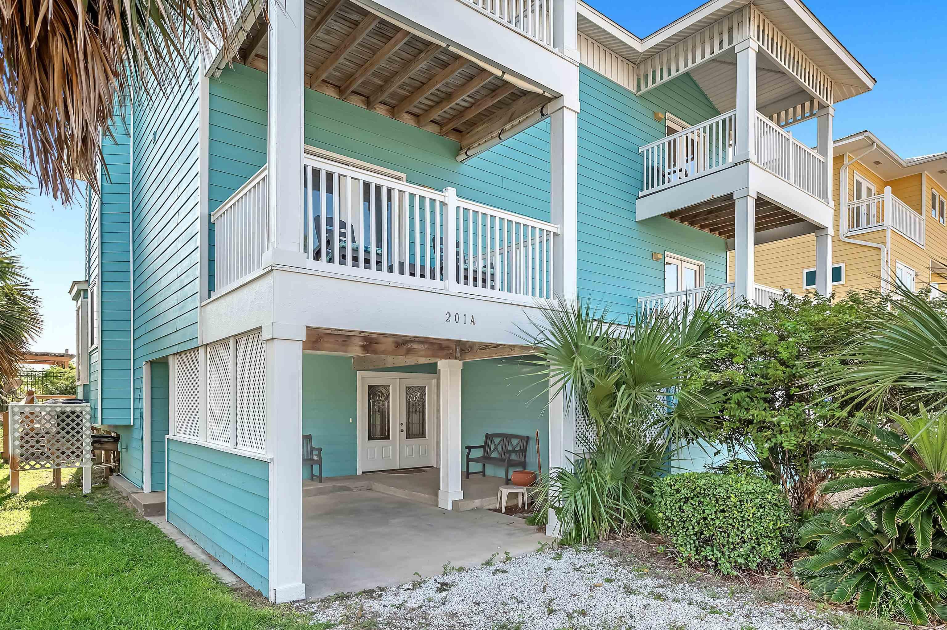 Image 3: Back of house featuring a patio area and a balcony