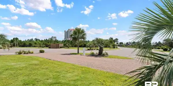 Image 2: View of grassy yard