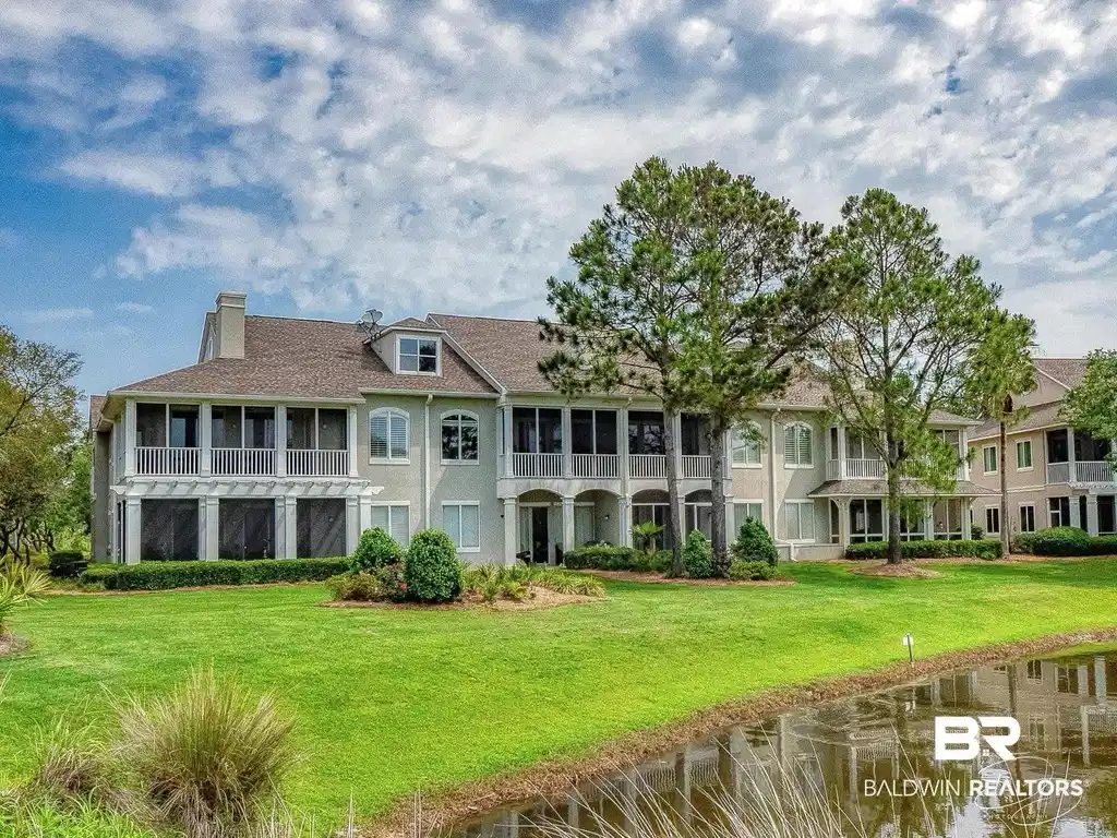Image 1: View of property with a water view