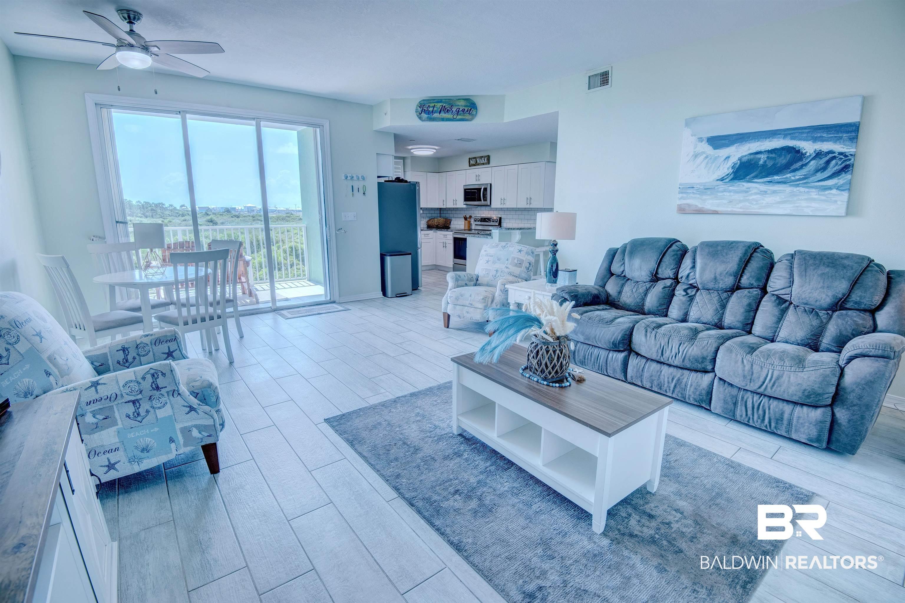 Image 3: Living room featuring a ceiling fan and light wood-style flooring