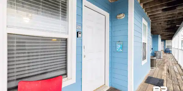 Image 3: View of exterior entry featuring central air condition unit