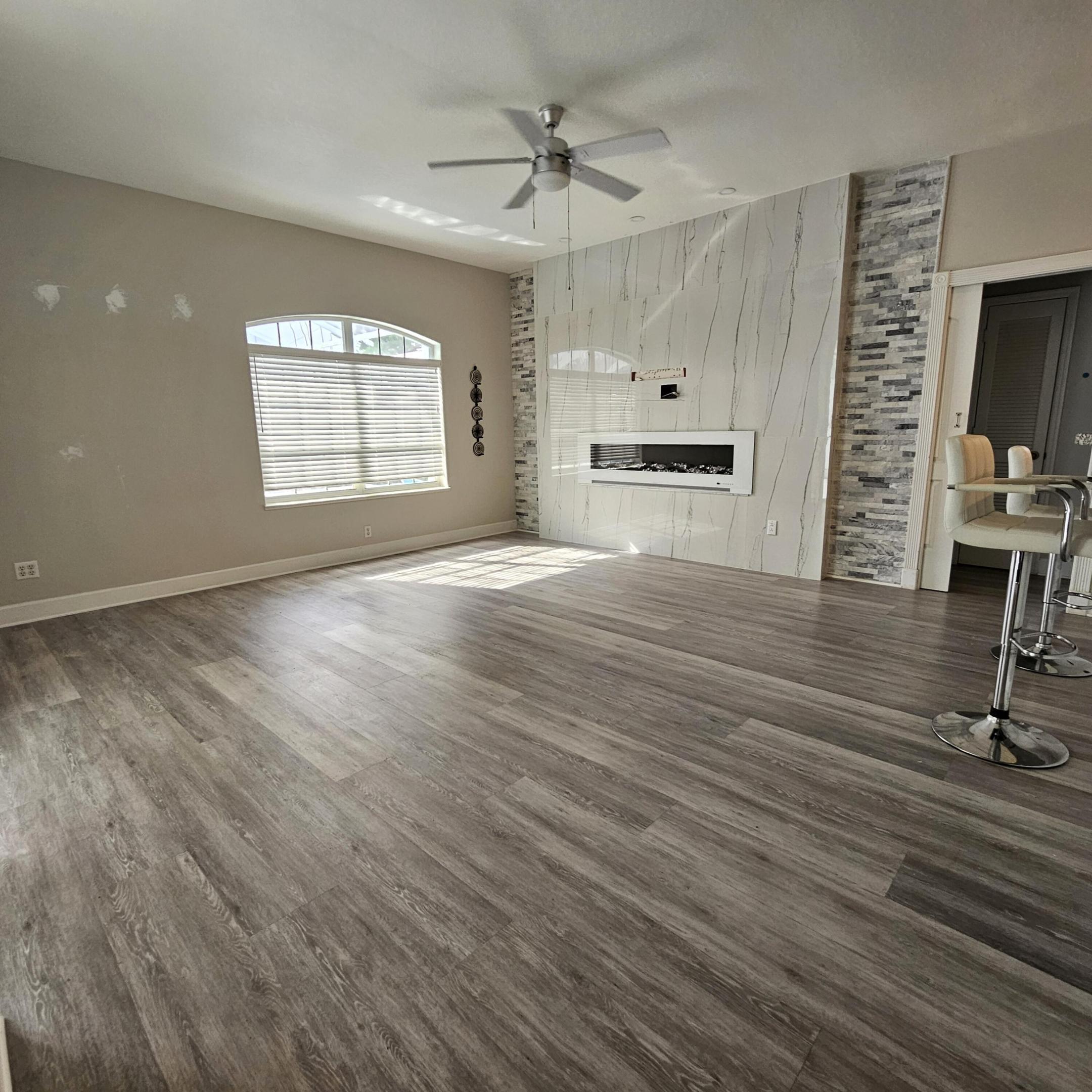 Image 2: Family Room with fireplace. TV Wall mount