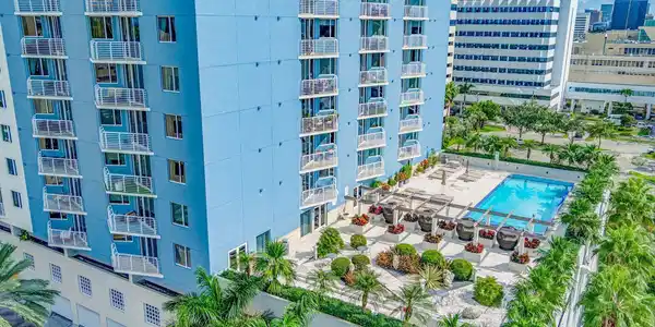 Image 3: Rooftop amenity deck featuring a swimming pool, lo
