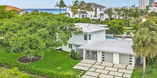 Image 3: Large driveway, two car garage, breezeway
