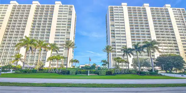 Image 2: Twin high-rise structures featuring extensive balc
