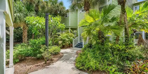 Image 3: TOWN HOME NESTLED IN THE LUSH LANSCAPE