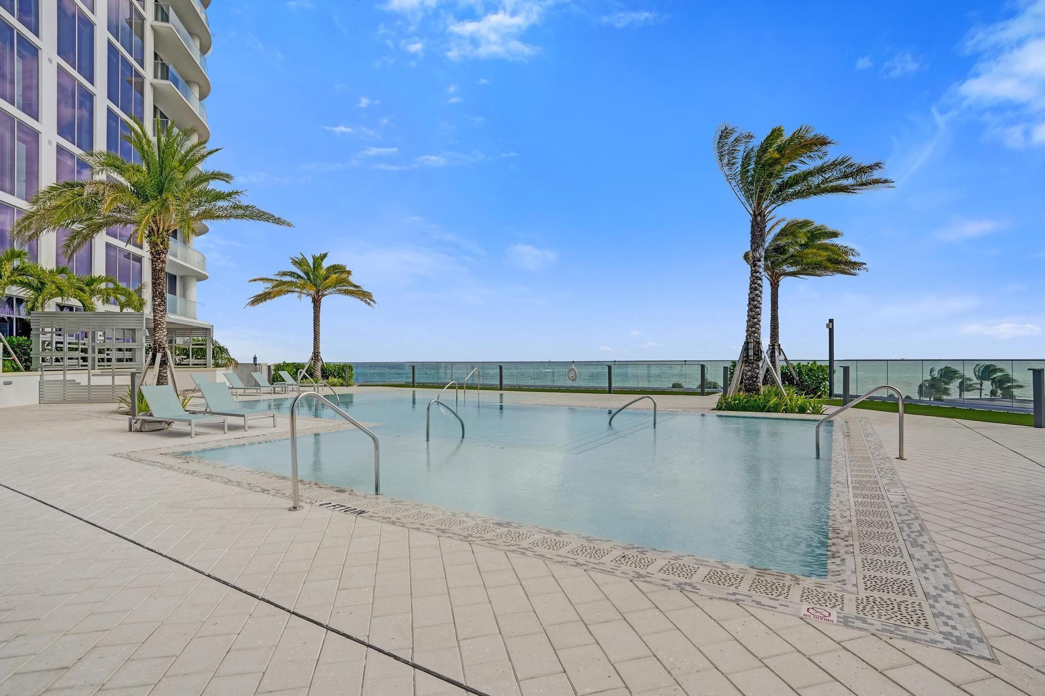 Image 3: Amazing pool deck overlooking the Atlantic Ocean.