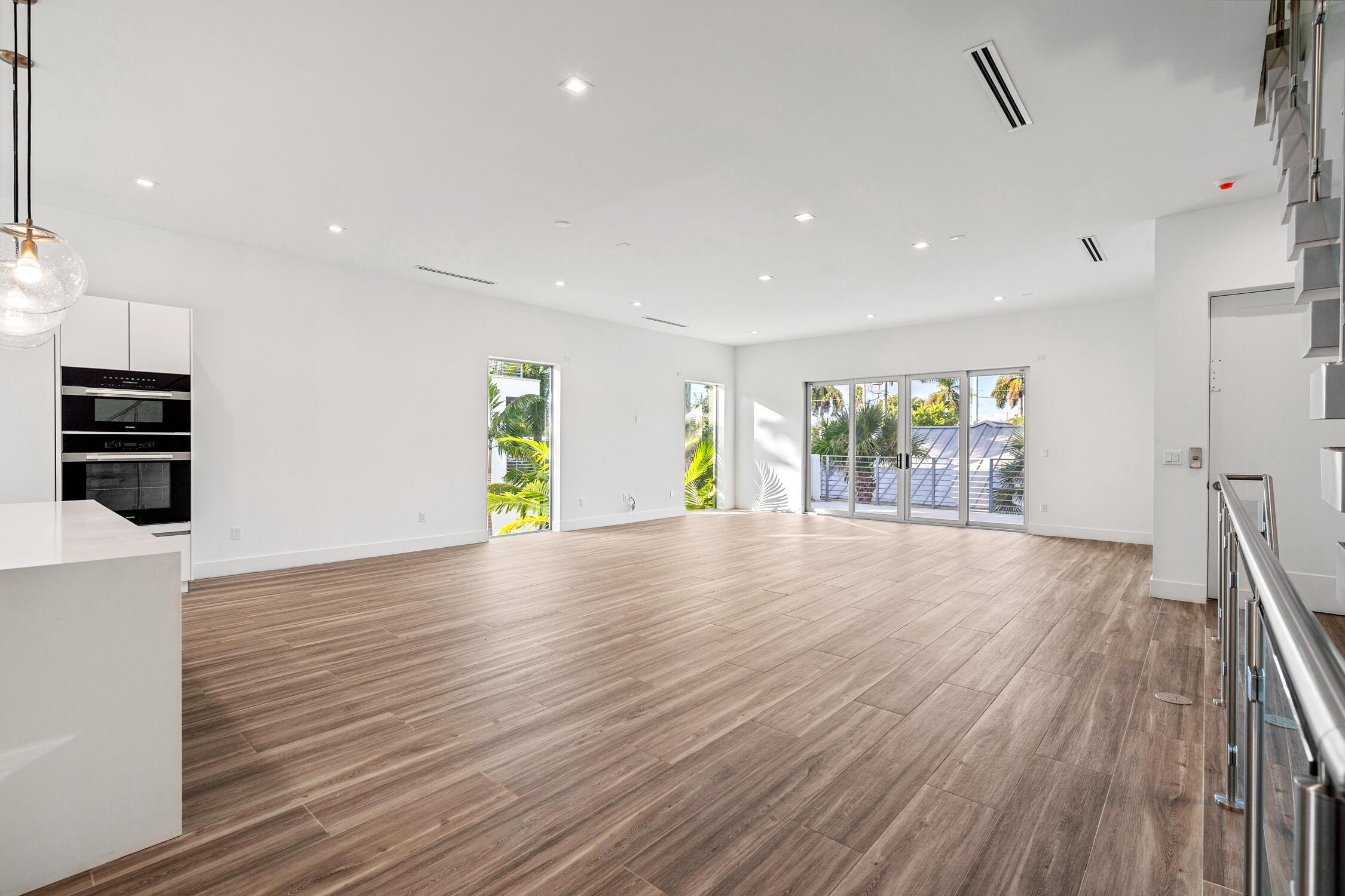 Image 3: Natural light cascades throughout this exceptional
