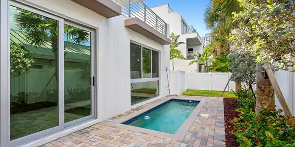 Image 4: Enjoy relaxing days lounging by your private pool.