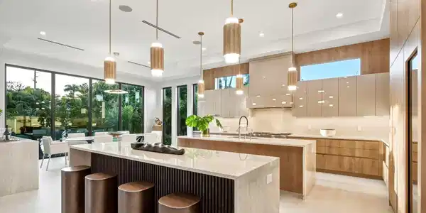 Image 4: Gourmet kitchen with double islands, light wood-fi