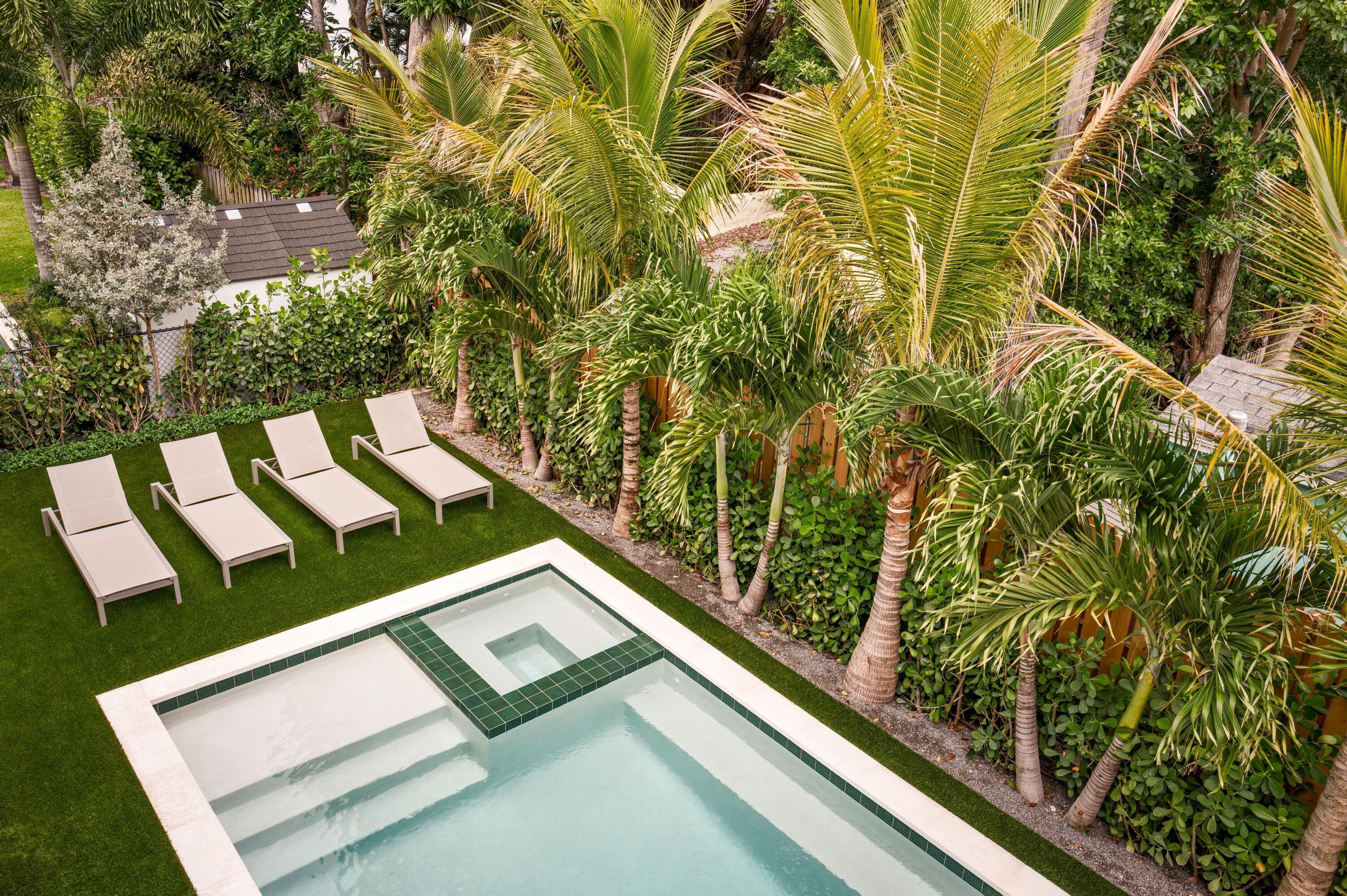Image 4: 07 - Backyard pool with green tile accen