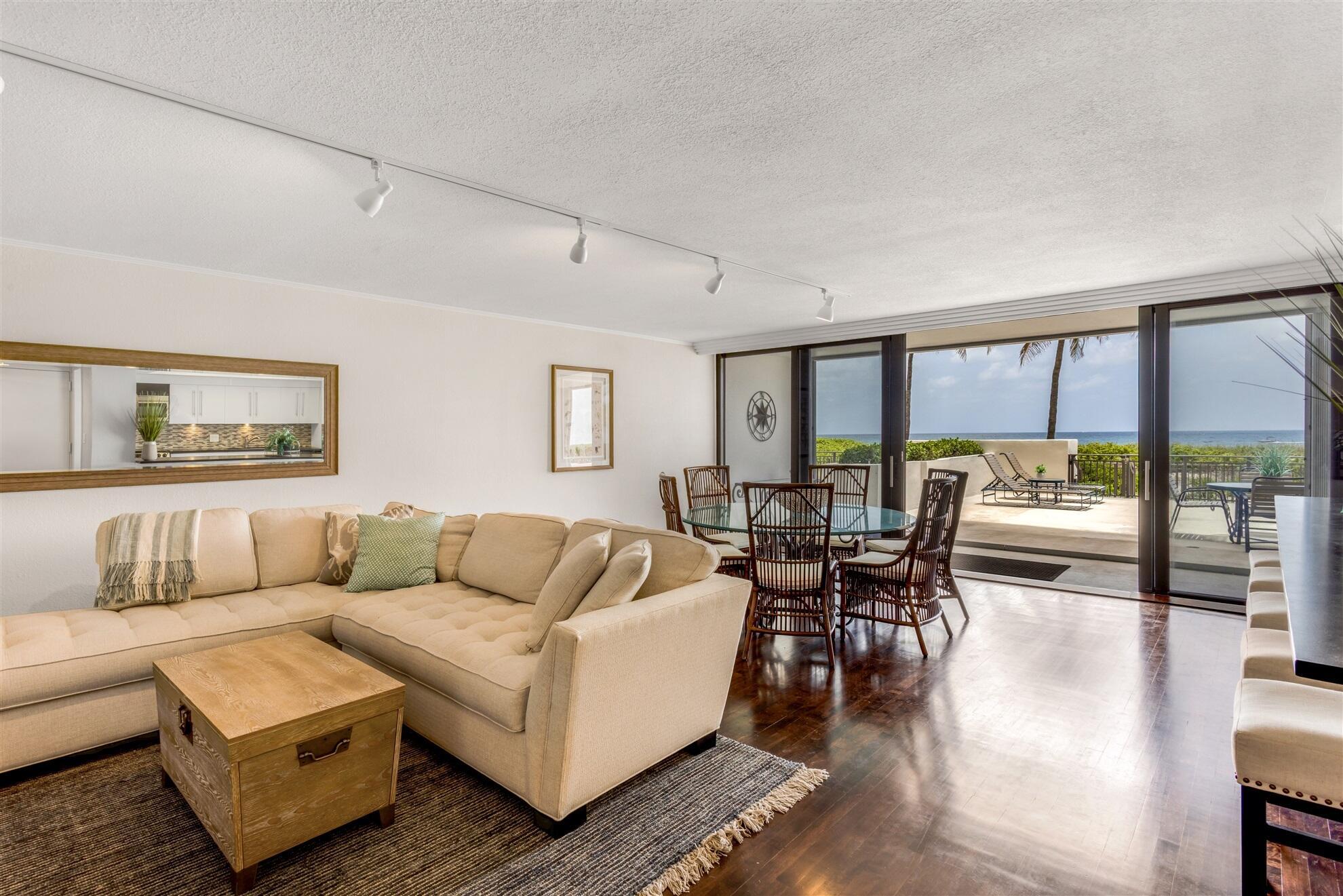 Image 3: LIVING ROOM TO PRIVATE PATIO & OCEAN