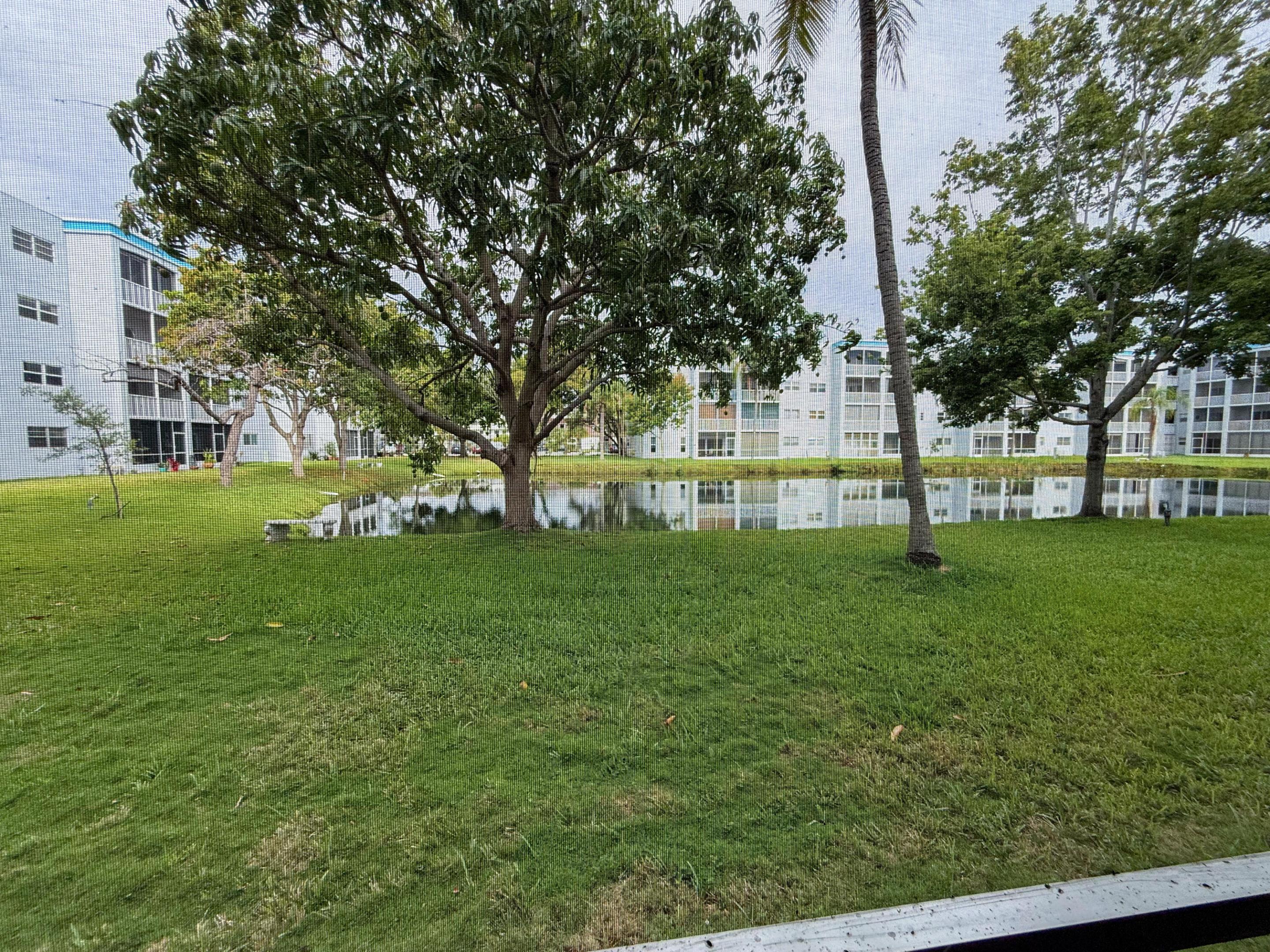 Image 1: Lake view from screened in porch