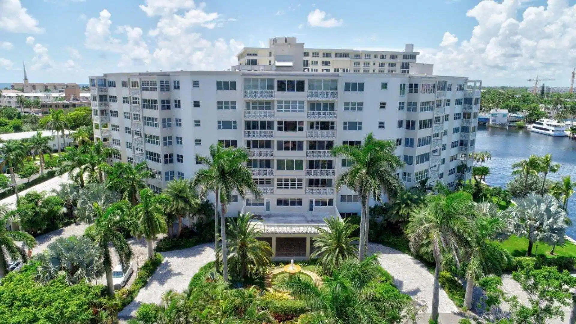 Image 1: Multi-story residential building with private balc