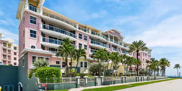 Image 3: Multi-story condominium building featuring private
